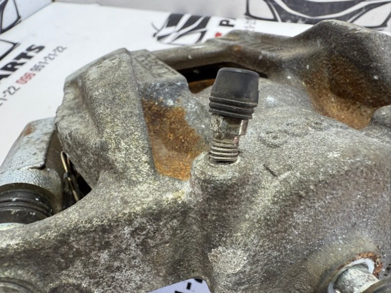Суппорт тормозной передний левый Rogue 2021 T33 2.5