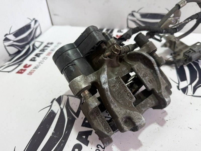 Суппорт тормозной задний правый Fusion 2013-2020 MK5
