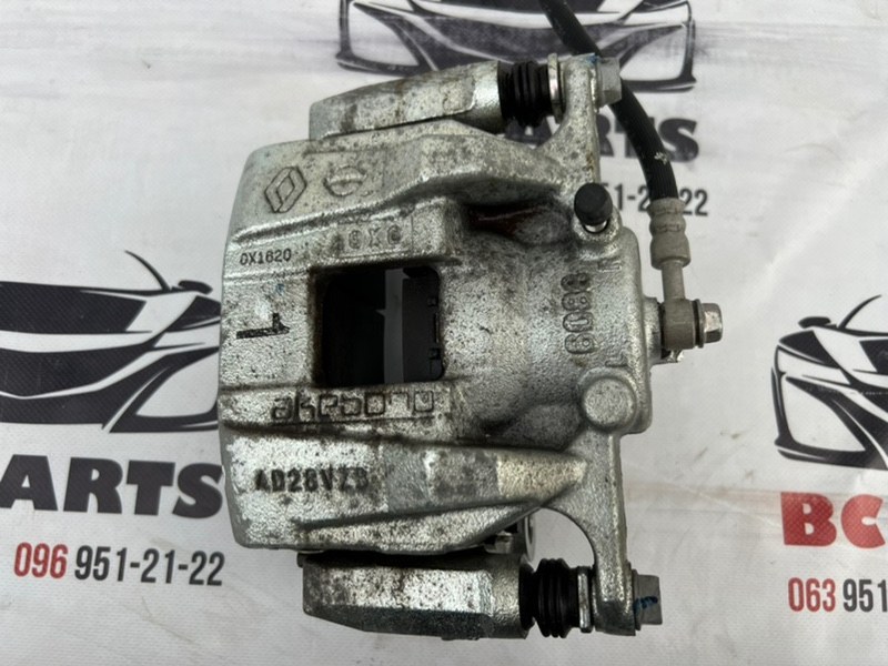 Суппорт тормозной передний правый Rogue 2020 T33 2.5