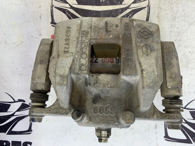 Суппорт тормозной передний левый Nissan Rogue 2021 T33 2.5 410116RR0A Б/У