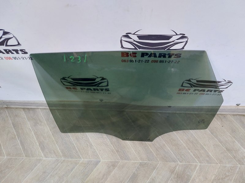 Стекло двери заднее левое Q3 2019-2024 83A