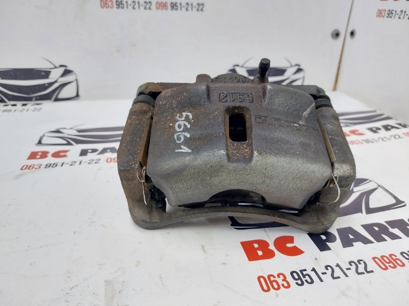 Суппорт тормозной передний левый Nissan Rogue T32 QR25 2.5