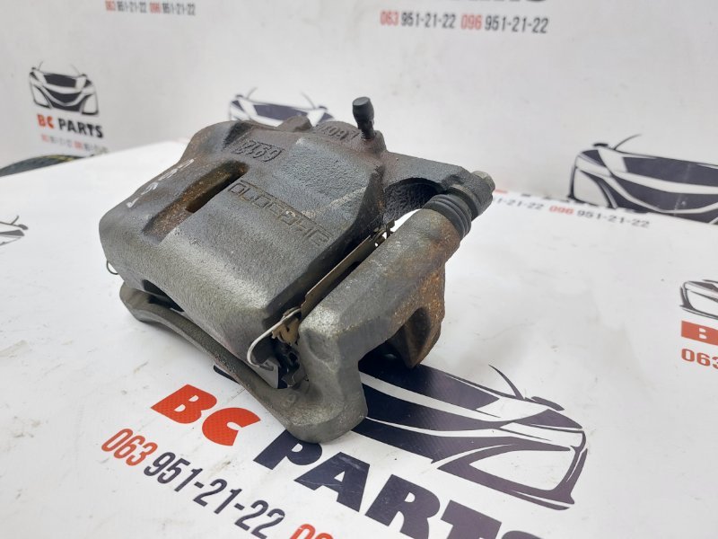 Суппорт тормозной передний левый Rogue 2017 T32 QR25 2.5