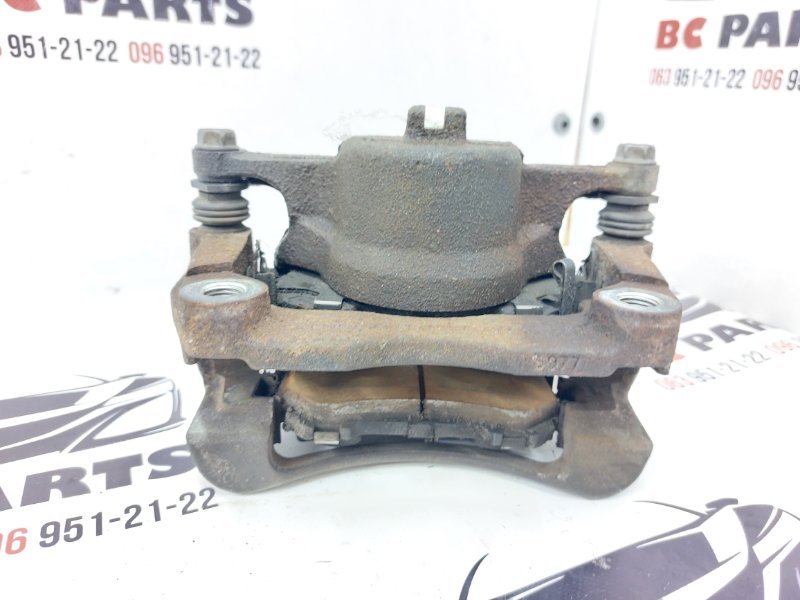 Суппорт тормозной передний левый Rogue 2017 T32 QR25 2.5