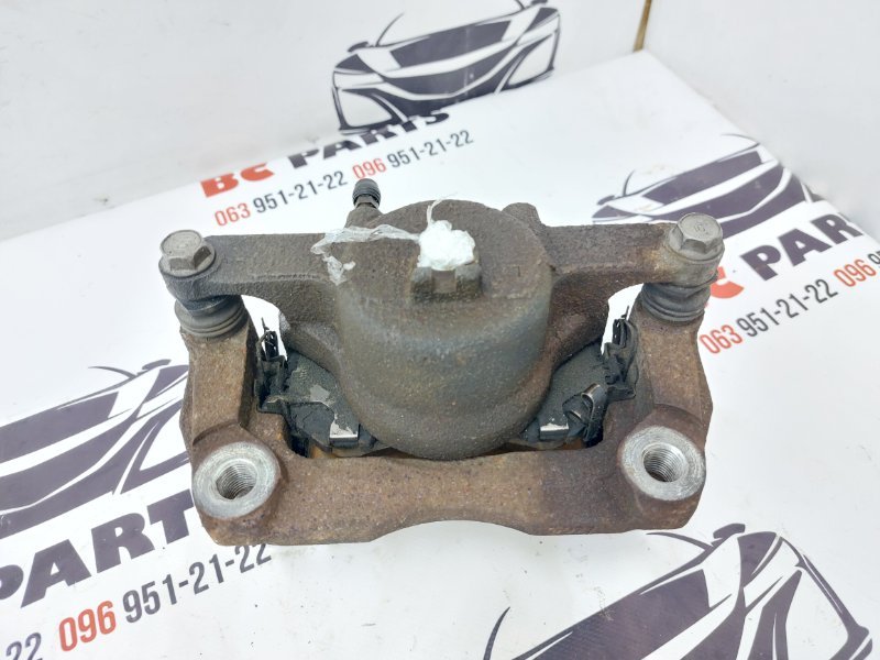 Суппорт тормозной передний левый Rogue 2017 T32 QR25 2.5