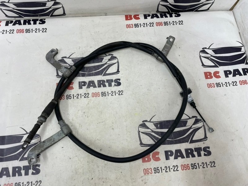 Трос стояночного тормоза левый Kia Soul 2022 2.0 59760K0100 Б/У