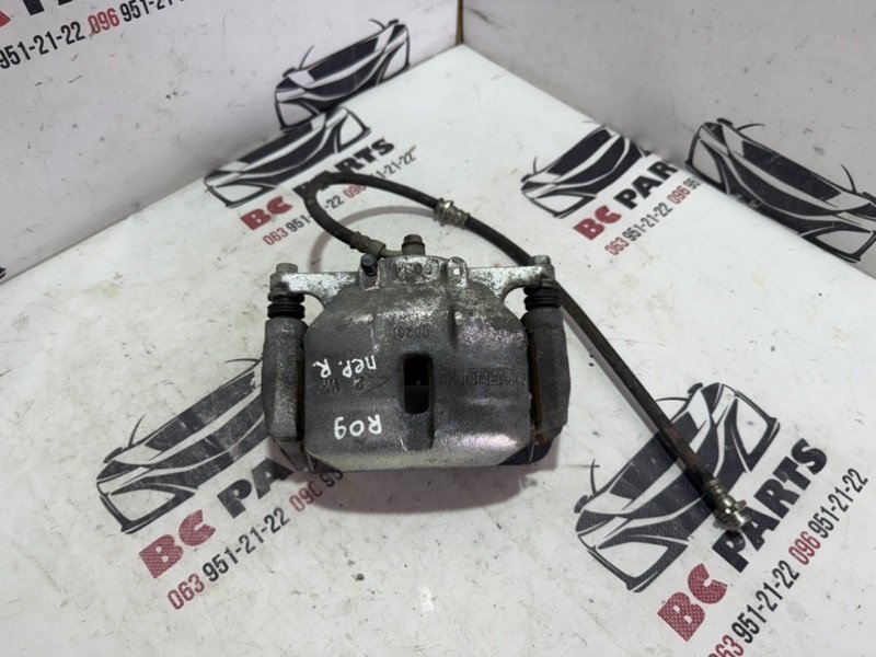 Суппорт тормозной передний правый Nissan Rogue 2013-2020 T32 410014BT0A Б/У