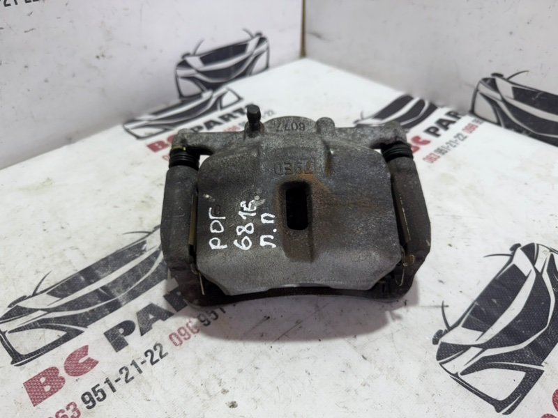 Суппорт тормозной передний правый Nissan Rogue 2013-2020 T32 410014BT0A Б/У