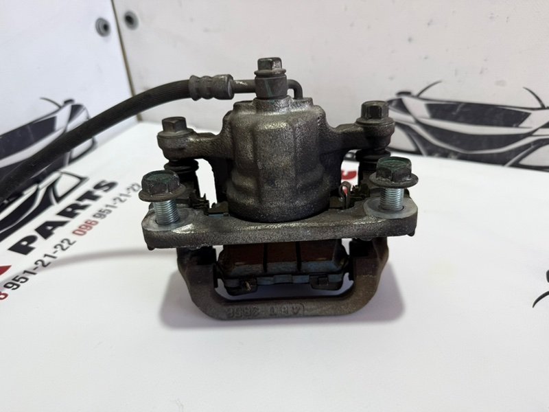 Суппорт тормозной задний правый Rogue 2013-2020 T32