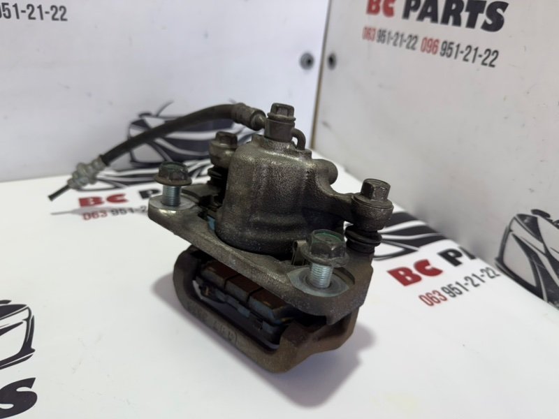 Суппорт тормозной задний правый Rogue 2013-2020 T32