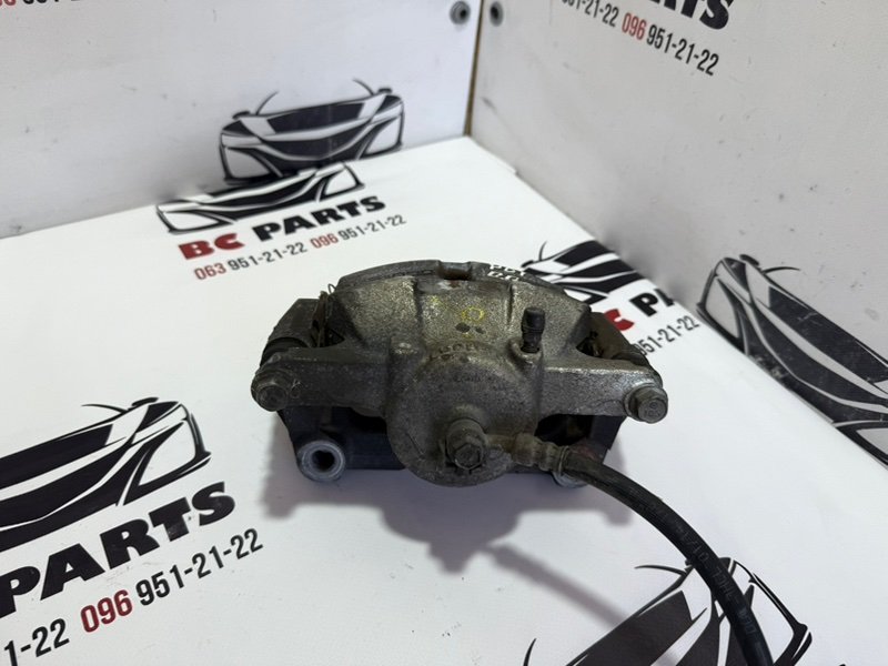 Суппорт тормозной передний правый Rogue 2013-2020 T32 Суппорт тормозной передний правый Rogue 2013-2020 T32