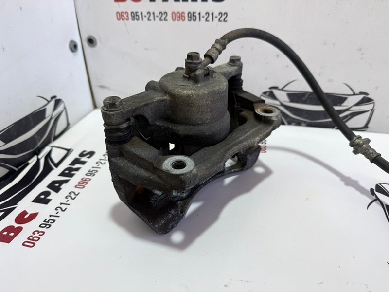 Суппорт тормозной передний правый Rogue 2013-2020 T32 Суппорт тормозной передний правый Rogue 2013-2020 T32