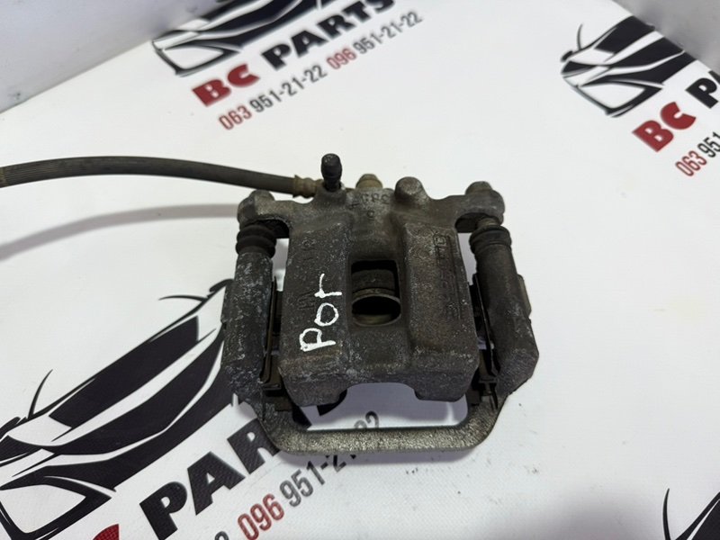 Суппорт тормозной задний левый Nissan Rogue 2013-2020 T32 44011-4CA0B Б/У