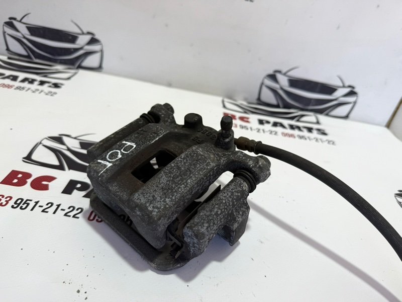 Суппорт тормозной задний правый Nissan Rogue T32