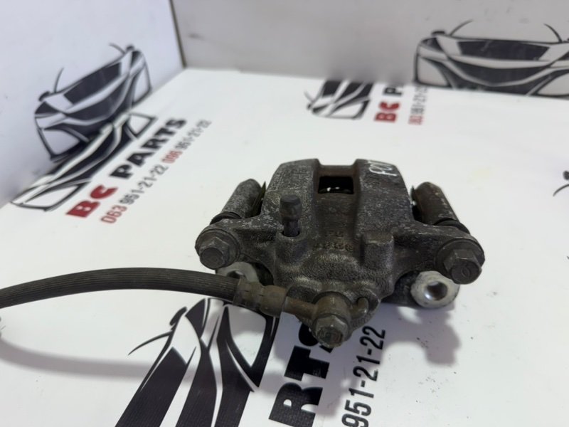 Суппорт тормозной задний правый Rogue 2013-2020 T32