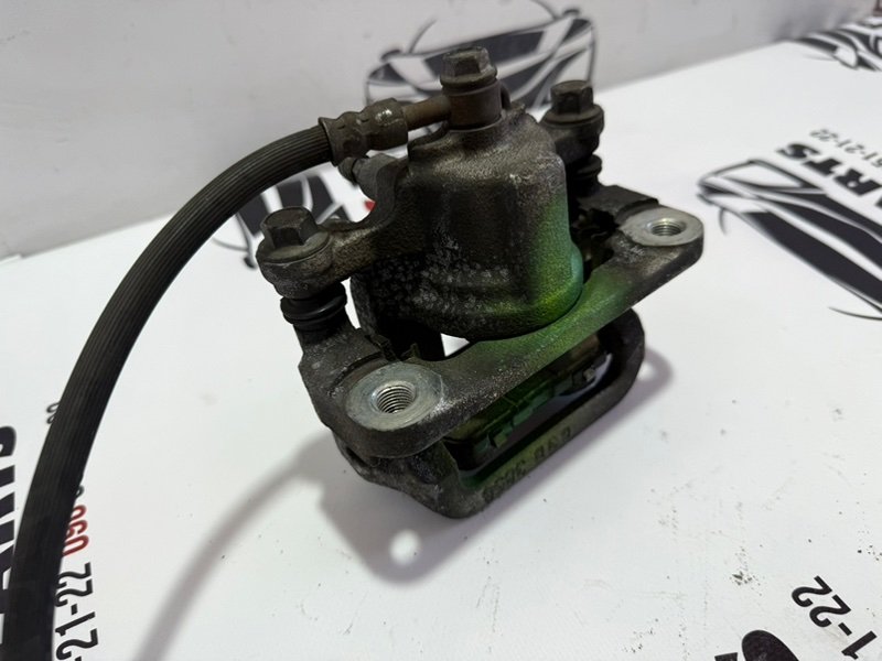 Суппорт тормозной задний правый Rogue 2013-2020 T32