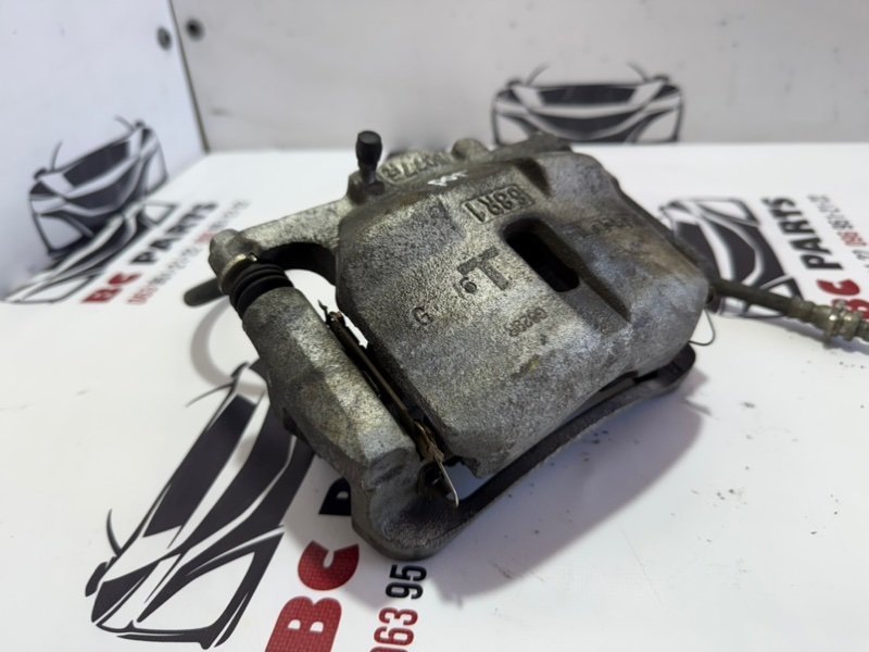 Суппорт тормозной передний правый Nissan Rogue T32 Суппорт тормозной передний правый Nissan Rogue T32