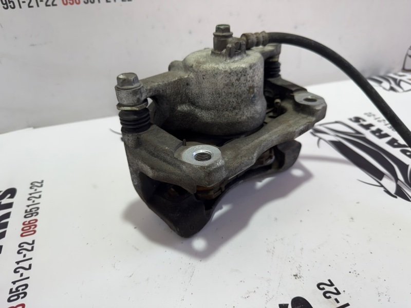 Суппорт тормозной передний правый Rogue 2013-2020 T32 Суппорт тормозной передний правый Rogue 2013-2020 T32