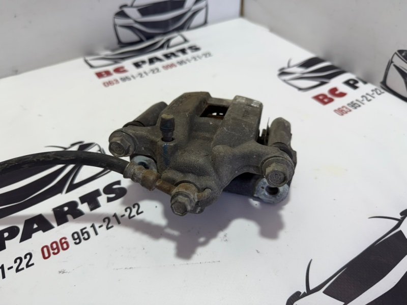 Суппорт тормозной задний правый Rogue 2013-2020 T32