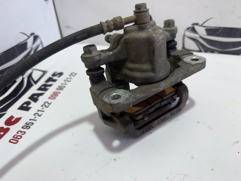 Суппорт тормозной задний правый Rogue 2013-2020 T32