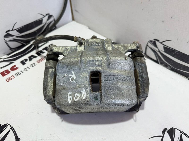 Запчасть суппорт тормозной передний правый Nissan Rogue 2013-2020 T32 410014BA0C Б/У Суппорт тормозной передний правый Nissan Rogue 2013-2020 T32 410014BA0C Б/У