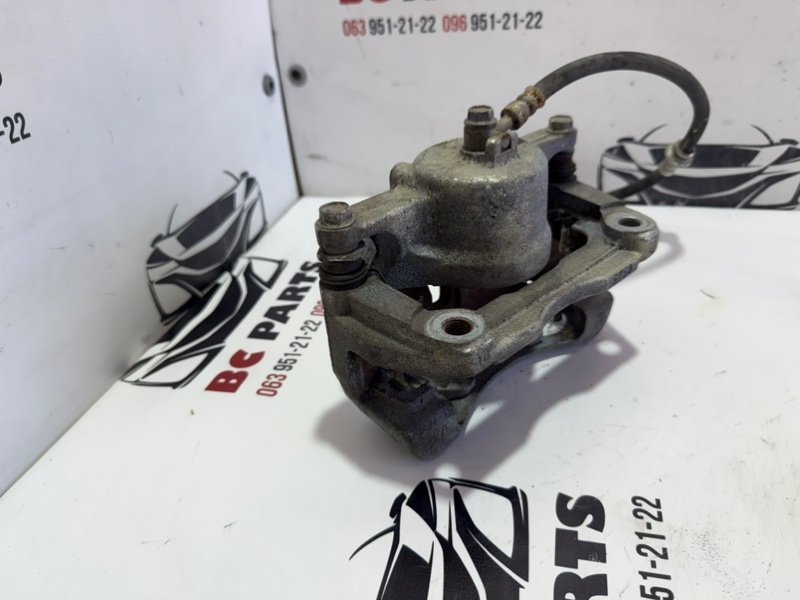 Суппорт тормозной передний правый Rogue 2013-2020 T32 Суппорт тормозной передний правый Rogue 2013-2020 T32