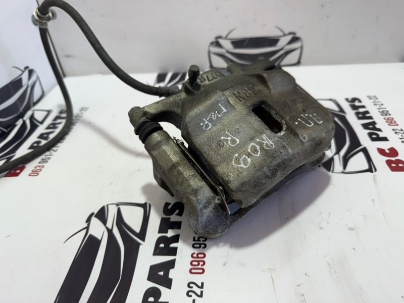 Суппорт тормозной передний правый Nissan Rogue T32 Суппорт тормозной передний правый Nissan Rogue T32