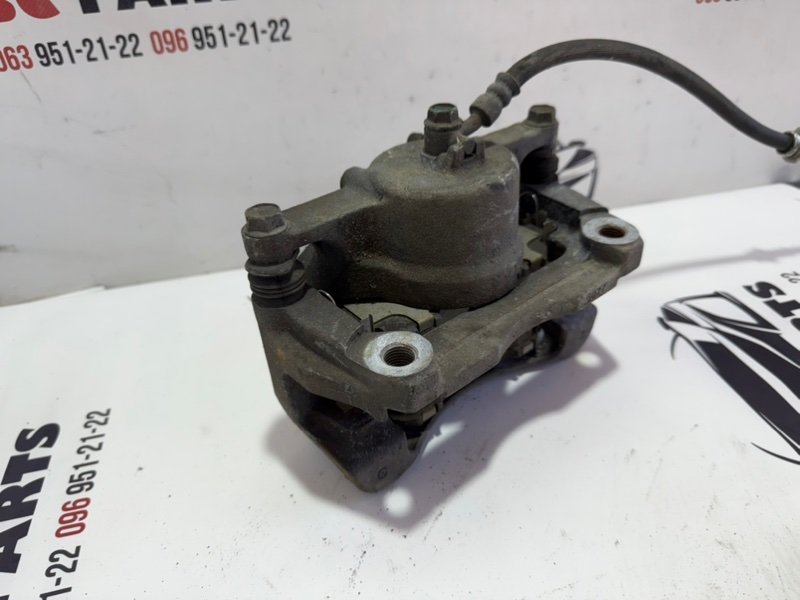 Суппорт тормозной передний правый Rogue 2013-2020 T32 Суппорт тормозной передний правый Rogue 2013-2020 T32