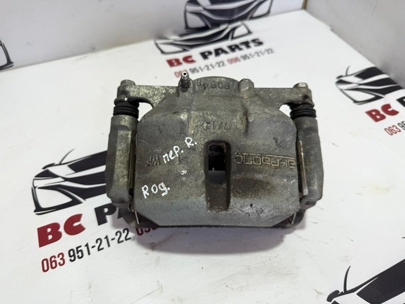 Запчасть суппорт тормозной передний правый Nissan Rogue 2013-2020 T32 410014BA0C Б/У Суппорт тормозной передний правый Nissan Rogue 2013-2020 T32 410014BA0C Б/У