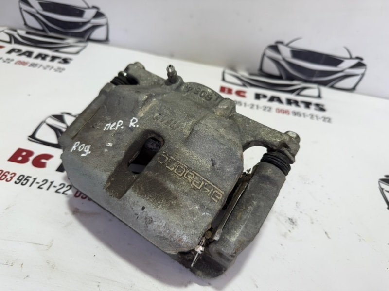 Суппорт тормозной передний правый Nissan Rogue T32 Суппорт тормозной передний правый Nissan Rogue T32