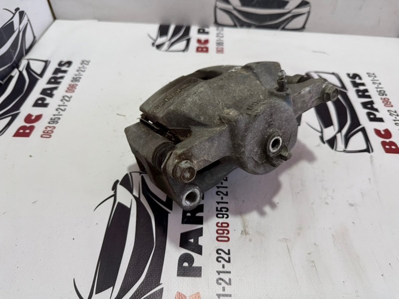 Суппорт тормозной передний правый Rogue 2013-2020 T32 Суппорт тормозной передний правый Rogue 2013-2020 T32