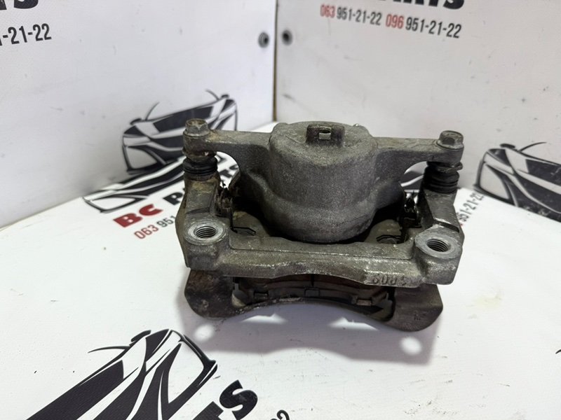 Суппорт тормозной передний правый Rogue 2013-2020 T32 Суппорт тормозной передний правый Rogue 2013-2020 T32