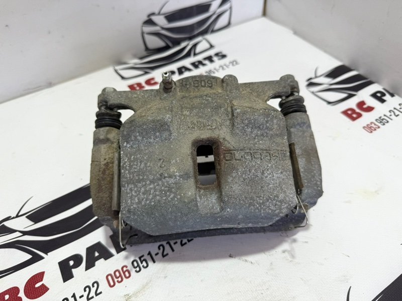 Суппорт тормозной передний правый Nissan Rogue 2013-2020 T32 410014BA0C Б/У