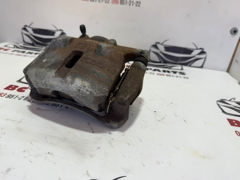 Суппорт тормозной передний правый Nissan Rogue Sport J11 Суппорт тормозной передний правый Nissan Rogue Sport J11