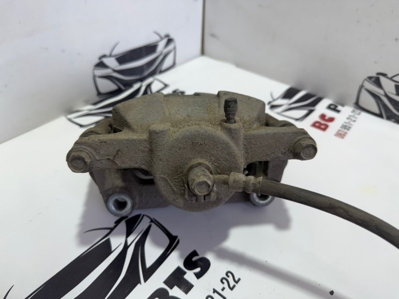 Суппорт тормозной передний правый Rogue 2013-2020 T32 Суппорт тормозной передний правый Rogue 2013-2020 T32