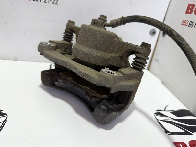 Суппорт тормозной передний правый Rogue 2013-2020 T32 Суппорт тормозной передний правый Rogue 2013-2020 T32