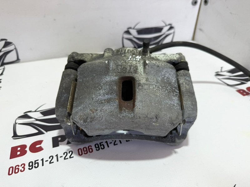 Суппорт тормозной передний левый Nissan Rogue 2013-2020 T32 410114BT0A Б/У