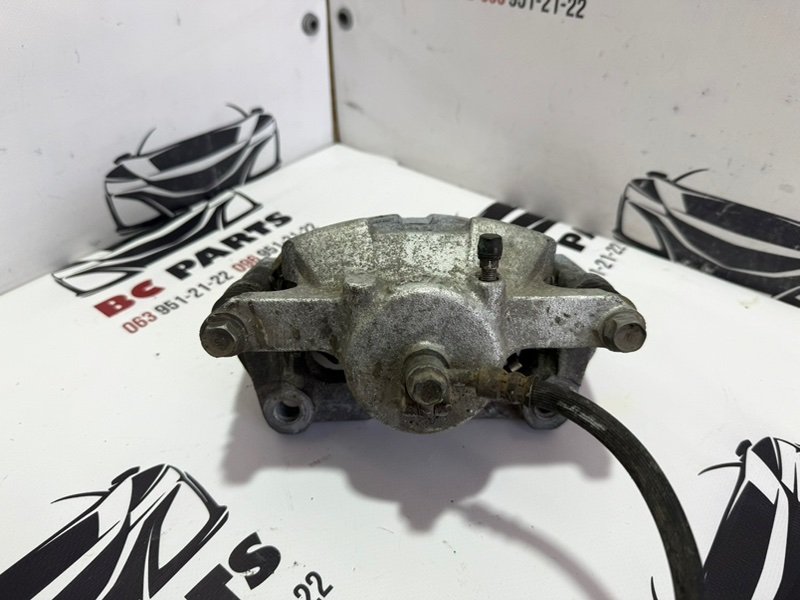 Суппорт тормозной передний правый Rogue 2013-2020 T32 Суппорт тормозной передний правый Rogue 2013-2020 T32