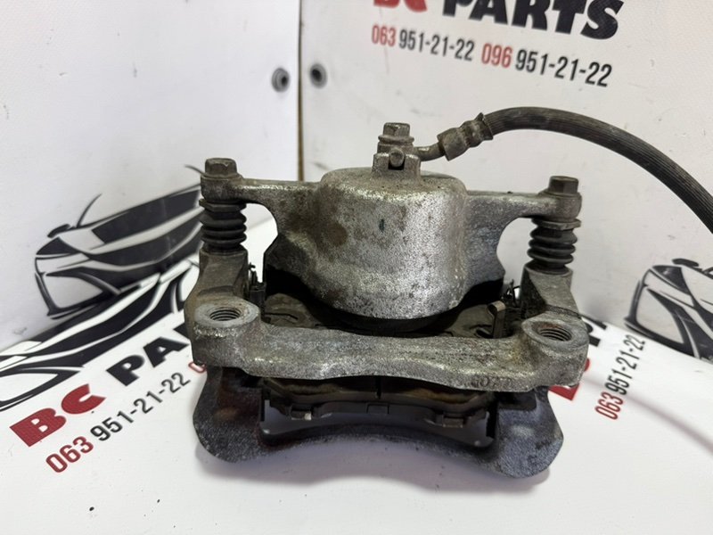 Суппорт тормозной передний правый Rogue 2013-2020 T32 Суппорт тормозной передний правый Rogue 2013-2020 T32