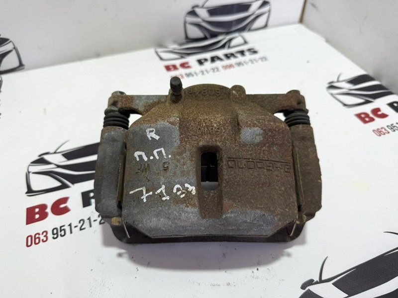 Суппорт тормозной передний правый Nissan Rogue 2013-2020 T32 410014BT0A Б/У