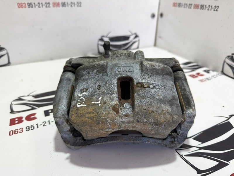 Суппорт тормозной передний левый Nissan Rogue 2013-2020 T32 410114BT0A Б/У