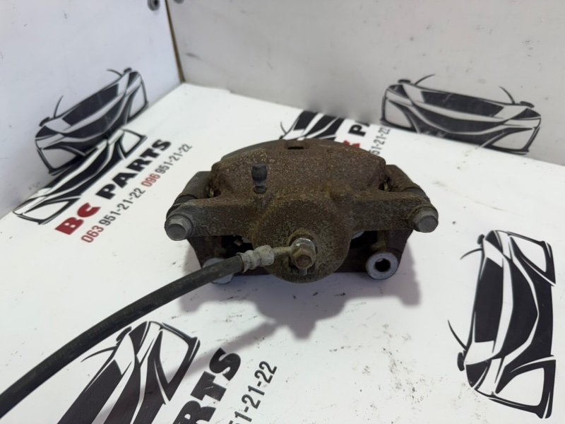 Суппорт тормозной передний левый Rogue Sport 2013-2020 J11