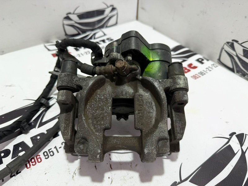 Запчасть суппорт тормозной задний левый Ford Fusion 2013-2020 MK5 DG9Z2553B Б/У Суппорт тормозной задний левый Ford Fusion 2013-2020 MK5 DG9Z2553B Б/У