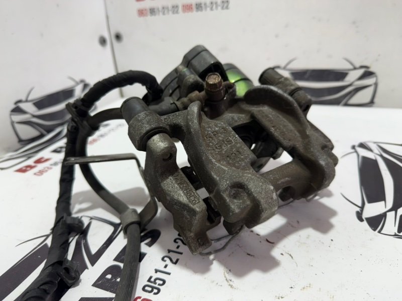 Суппорт тормозной задний левый Ford Fusion MK5 Суппорт тормозной задний левый Ford Fusion MK5