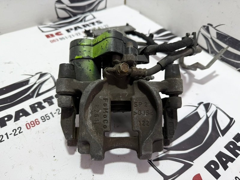 Запчасть суппорт тормозной задний правый Ford Fusion 2013-2020 MK5 DG9Z2552C Б/У Суппорт тормозной задний правый Ford Fusion 2013-2020 MK5 DG9Z2552C Б/У