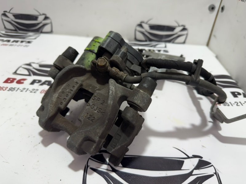 Суппорт тормозной задний правый Ford Fusion MK5 Суппорт тормозной задний правый Ford Fusion MK5