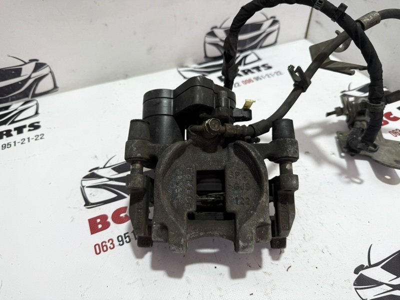 Суппорт тормозной задний правый Ford Fusion 2013-2020 MK5 DG9Z2552C Б/У
