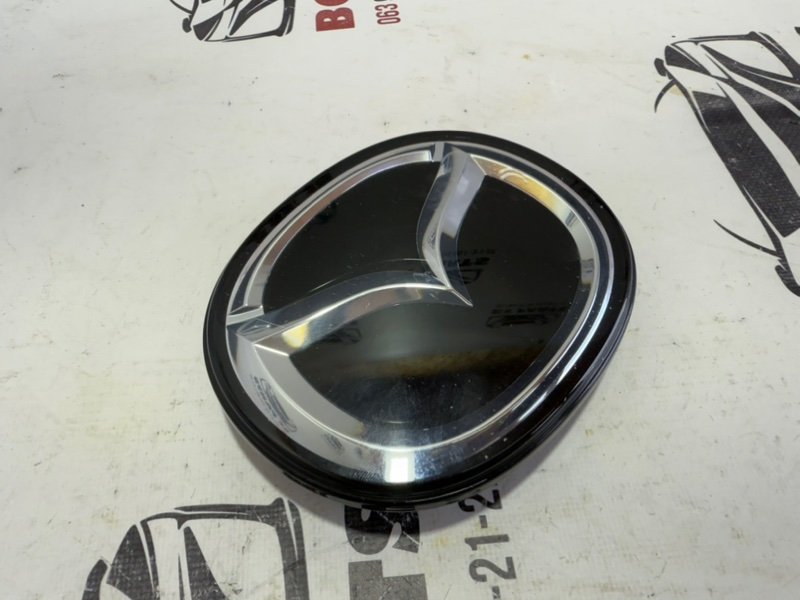 Эмблема Mazda 3 2.5
