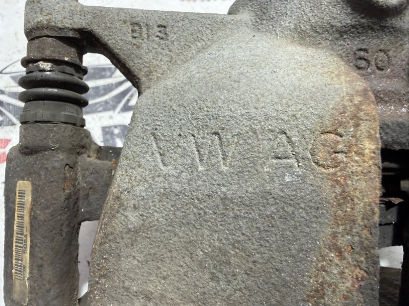 Суппорт тормозной передний левый Tiguan 2020 2.0