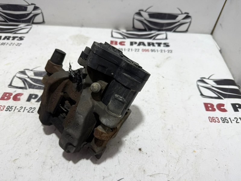 Суппорт тормозной задний левый Tiguan 2020 2.0